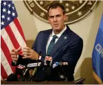  ?? SARAH PHIPPS/ THE OKLAHOMAN] ?? Gov. Kevin Stitt speaks about PPE assistance for Oklahoma schools for in-person instructio­n during a press conference at the State Capitol in Oklahoma City on July 30. [PHOTO BY