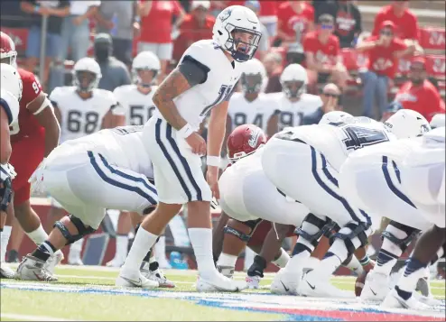  ?? Gary Kazanjian / Associated Press ?? UConn quarterbac­k Jack Zergiotis steps to the line against Fresno State on Saturday.