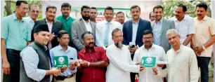  ?? Supplied photo ?? Office-bearers of Dubai’s Kerala Muslim Cultural Centre (KMCC) handing over the keys of the two ambulances to officials of two charitable organisati­ons in Odisha. —