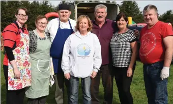  ??  ?? Niamh and Bernie Costello, Mike O’Shea, Marian Barnes, Brendan Ferris Organiser, Therese Darmody and Frank McCarthy working at the Threshing Cancer in Beaufort on Sunday.