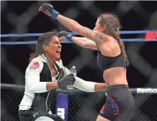  ?? MARK J. REBILAS, USA TODAY SPORTS ?? Amanda Nunes, left, celebrates with partner Nina Ansaroff after Ansaroff beat Jocelyn Jones-Lybarger in January.