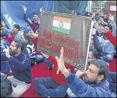  ?? PTI ?? Members of the Kashmiri Pandit community protesting against Israeli filmmaker Nadav Lapid's remarks on the movie ’The Kashmir Files’ in Jammu.