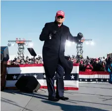  ?? — AFP photo ?? Trump dances after speaking during a Make America Great Again rally at Dubuque Regional Airport in Dubuque, Iowa.