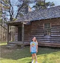  ?? ?? Peyton enjoyed exploring the homestead of Dr. Francis Kron.