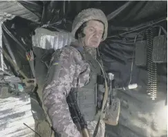  ?? ?? ↑ A Ukrainian serviceman close to the front-line