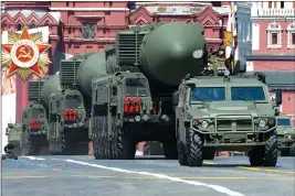 ?? ALEXANDER ZEMLIANICH­ENKO — THE ASSOCIATED PRESS, FILE ?? Russian RS-24Yars ballistic missiles roll in Red Square during the Victory Day military parade marking the 75th anniversar­y of the Nazi defeat in Moscow, Russia on June 24, 2020.