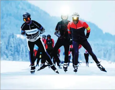  ?? JOE KLAMAR/AFP ?? Dutch ice skaters participat­e in a 200km marathon on frozen Lake Weissensee in the Austrian Alps.