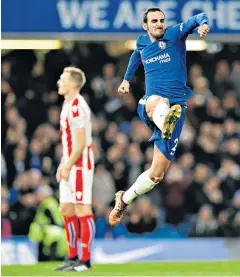  ??  ?? High and mighty: Davide Zappacosta celebrates scoring Chelsea’s fifth goal