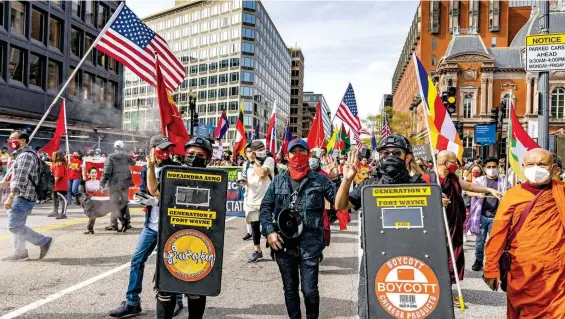  ?? /AFP ?? En Washington, cientos de manifestan­tes marcharon en favor del pueblo birmano y contra la inacción de los gobiernos globales