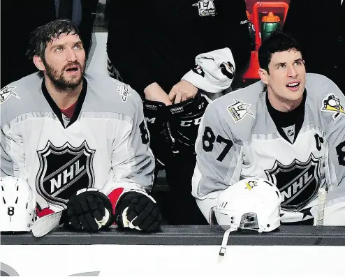  ?? HARRY HOW / GETTY IMAGES ?? Alex Ovechkin and Sidney Crosby failed to record a point in the final, but they showed that they could play nice together with Crosby feeding Ovechkin at the side of the net for a goal in an earlier game.