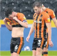  ??  ?? IN HIDING Hull’s Richard Smallwood reacts after the match