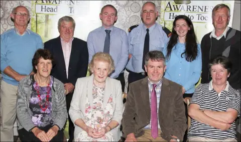  ??  ?? BELOW: Back: Mervyn Jones, Leslie Dixon, John Kelly, Inspector Pat Cody, Una Sinnott and Michael O’Neill. Front: Emily Burke, Anna May McHugh, who performed the launch, chairman George Graham and Anne Murphy.