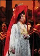  ?? ?? Mezzo-soprano Wu Hongni plays the role of Baochai in the opera.