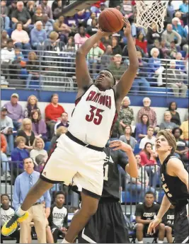  ?? Photo by Steven Eckhoff ?? Chattooga’s Dee McCutchins goes up for a basket during Friday’s game against Coosa. The Indians defeated the Eagles to head to the Region 7-AA tournament title game.