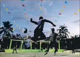  ?? Gary Coronado Los Angeles Times ?? KIDS PLAY soccer in a San Juan de Abajo plaza. Over decades, the town in the Pacific Coast state of Nayarit has funneled hundreds of people to Lincoln Heights.