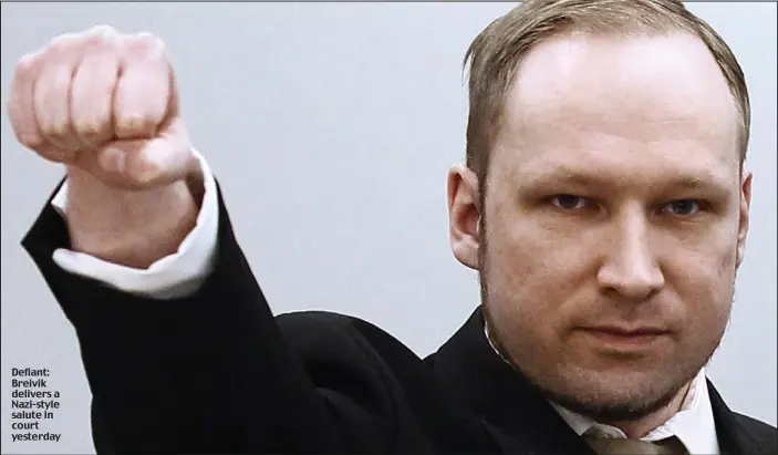  ??  ?? Defiant: Breivik delivers a Nazi-style salute in court yesterday