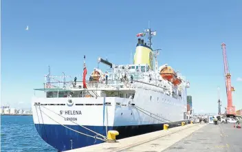  ??  ?? TIED UP The RMS St Helena docked in Cape Town before departing for St Helena for the last time.