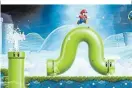  ?? ?? Normalerwe­ise klettert Mario in Röhren, in Wonder wird darauf geritten