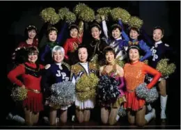  ??  ?? Members of Japan Pom-Pom squad with founder Takino (front row, extreme left).