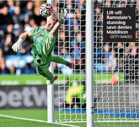  ?? GETTY IMAGES ?? Lift-off: Ramsdale’s stunning save denies Maddison