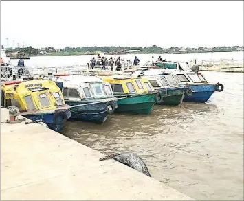  ?? ?? Passenger boats at Lagos jetty