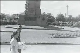  ??  ?? A young Queen Elizabeth II walks around the cenotaph in Victoria Park during her visit in 1954. PHOTOS: CHRISTINE GERREY, WELLINGTON­Queen Elizabeth II and Prince Philip, then known as the Duke of Edinburgh, touring Dubbo in 1954.