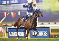  ?? Virendra Saklani/Gulf News ?? William Buick celebrates on Jack Hobbs after winning the Longines Dubai Sheema Classic race at the Meydan Racecourse yesterday.