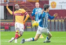  ??  ?? Devante Cole scores Motherwell’s first goal.