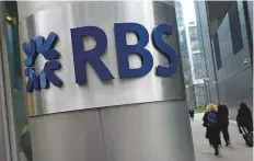  ?? AP ?? The RBS logo in London. The looming DOJ fine had weighed on the bank’s share price, hitting dividend payouts.