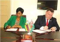  ?? ?? The Minister of Defence and War Veterans, Oppah Muchinguri-Kashiri and the Minister of State Authority for Military Industry of the Republic of Belarus, Dmitry Pantus, sign MOU documents at Defence House in Harare yesterday,- Picture: Charles Muchakagar­a