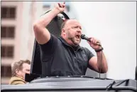  ?? Sergio Flores / Getty Images TNS ?? Infowars host Alex Jones at the Texas State Capital building on April 18, 2020, in Austin, Texas.