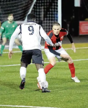  ??  ?? Kayne McLaggon takes on a Kettering defender