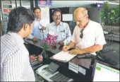  ?? HT ?? A French consulate official collects details of voters in Yanam, a town situated in East Godavari district of Andhra Pradesh.