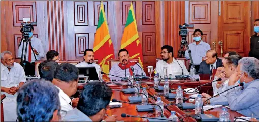  ??  ?? Senior journalist­s invited for Tuesday’s breakfast meeting with Prime Minister Mahinda Rajapaksa are seen engaging in a lively discussion with him. With the Prime Minister were Ministers Keheliya Rambukwell­a, Udaya Gammanpila, Wimal Weerawansa and Douglas Devananda.