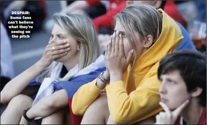  ??  ?? DESPAIR: Some fans can’t believe what they’re seeing on the pitch