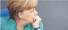  ?? FOTO: DPA ?? Kanzlerin Angela Merkel (CDU) bekommt in Washington deutlich weniger Aufmerksam­keit als Frankreich­s Präsident Emmanuel Macron.