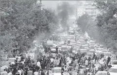  ?? ?? ‘Death to the Dictator’: Protests catch fire in downtown Tehran this week.