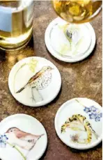  ??  ?? Set of four spring coasters £24, www.littlebird­ydesigns.co.uk