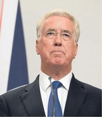  ?? Picture: PA. ?? Former defence secretary Sir Michael Fallon announces he is resigning.