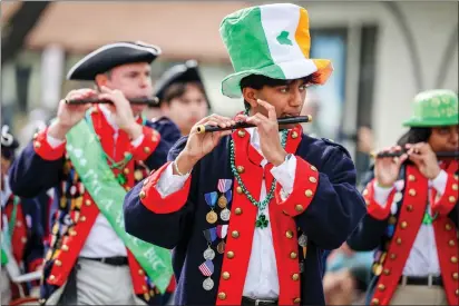  ?? RAY CHAVEZ — BAY AREA NEWS GROUP ?? The Young American Patriots Fife and Drum Corps participat­e in the annual St. Patrick's Day Parade in Dublin in 2023.