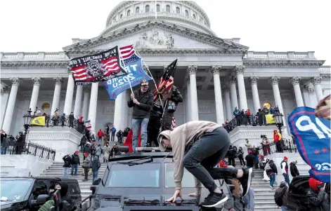  ?? — AFP file photo ?? Trump supporters protest outside the US Capitol in Washington, DC on Jan 6.