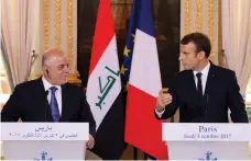 ?? EPA ?? Prime minister of Iraq, Haider Al Abadi, and French president Emmanuel Macron at the Elysee Palace in Paris yesterday