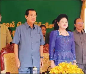  ?? FACEBOOK ?? Prime Minister Hun Sen and first lady Bun Rany preside over a inaugurati­on ceremony for a cement factory in Battambang province on Thursday.