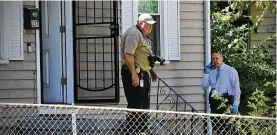  ?? MARSHALL GORBY / STAFF ?? The bodies of a woman and girl were found June 23 inside a house in the 300 block of Burleigh Avenue in Dayton.