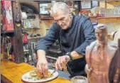  ?? AFP ?? A chef prepares a dish at Belgrade's Korcagin restaurant.