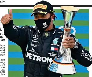  ?? AFP ?? 91 not out: Hamilton celebrates his Eifel Grand Prix victory