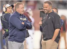  ?? MITCHELL LEFF, GETTY IMAGES ?? Temple’s Matt Rhule, right, with Brian Kelly, has met with Virginia Tech’s Justin Fuente and Air Force’s Troy Calhoun.