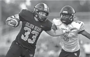  ?? NICOLAS GALINDO/THE COLUMBUS DISPATCH ?? Running back Carson Gresock helped Upper Arlington to an undefeated regular season and a spot in a Division I state semi.