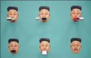  ?? BLOOMBERG ?? USB drives are displayed on depictions of North Korean leader Kim Jong Un at the Flash Drives For Freedom exhibition in Austin, Texas.