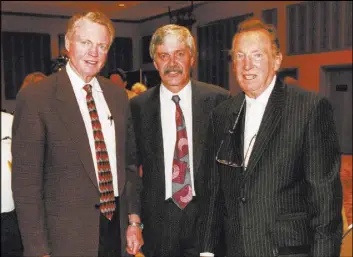  ?? Las Vegas Review-Journal file ?? Former Nebraska coach Tom Osborne, left, former Cornhusker All-American David Humm and late Raiders owner Al Davis attend the Southern Nevada Sports Hall of Fame dinner in 1997. Humm, one of the most notable quarterbac­ks in Nevada prep history, died March 27 at age 65.